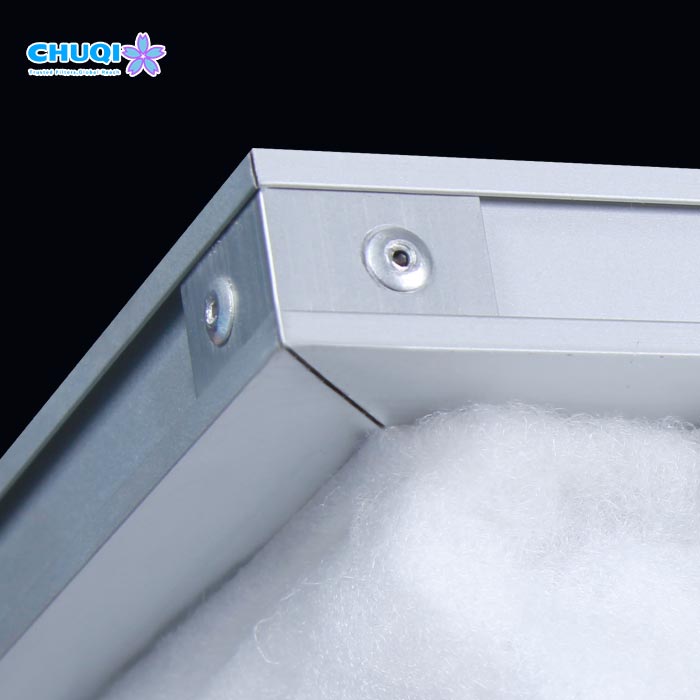 Ultrasonic welded pockets attached to aluminum alloy frame for bag air filter