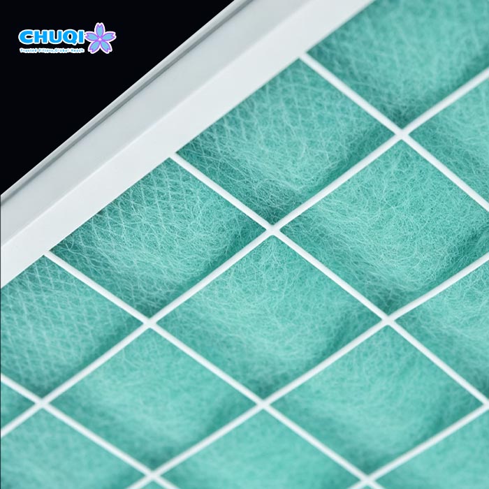 High-density fiberglass filter element with rigid metal support grid