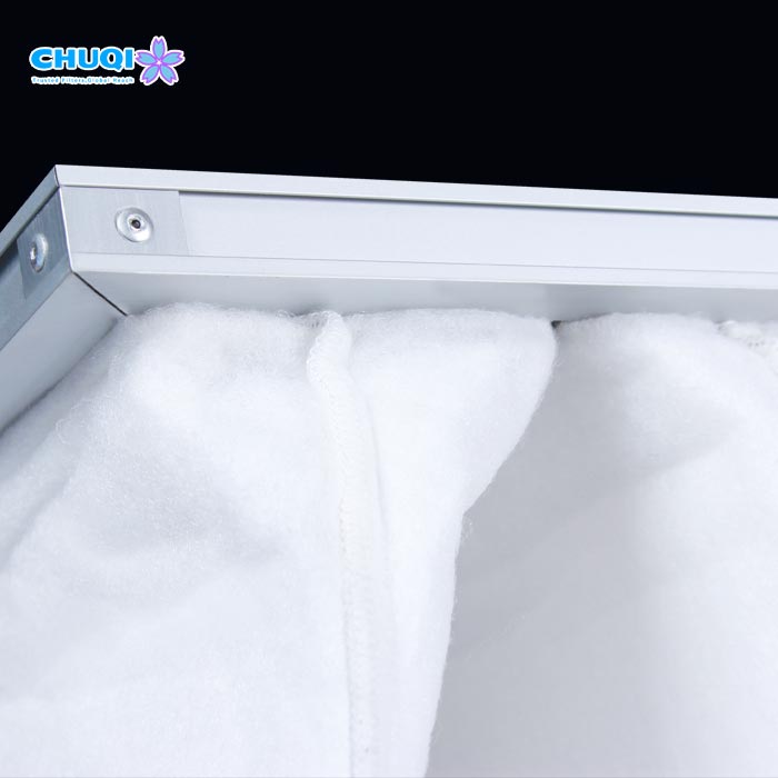 Extruded aluminum alloy frame corner and synthetic filter media detail
