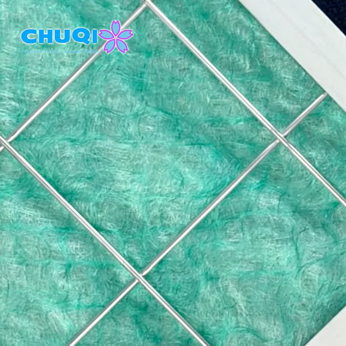Progressive density fiberglass filter media element with cross metal grid support