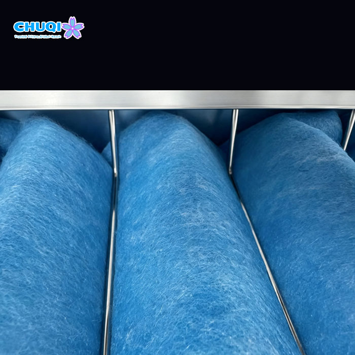 Detailed view of blue and white progressive density filter media for G4 spray booth intake filter
